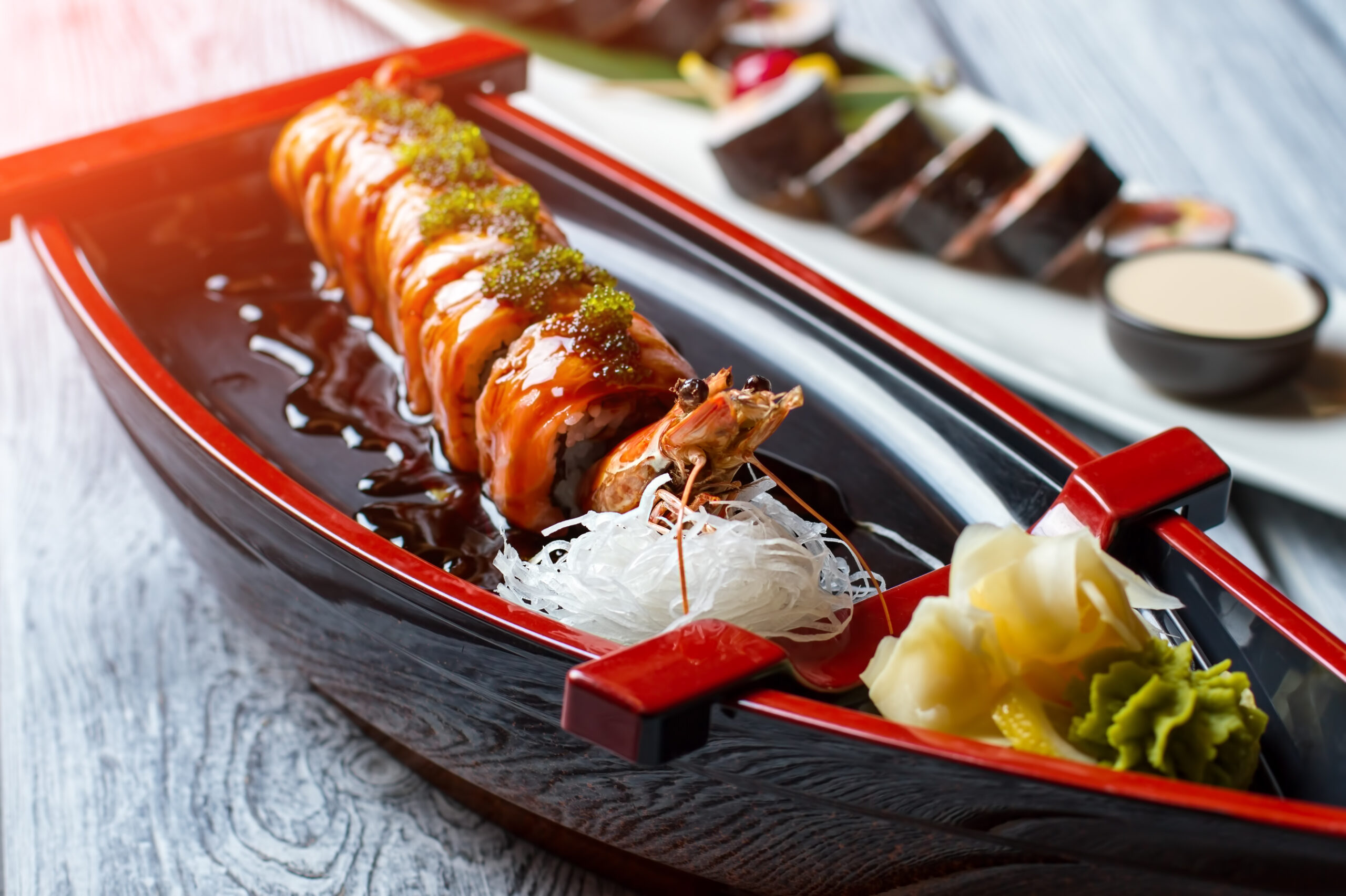 Shrimp on sushi boat.